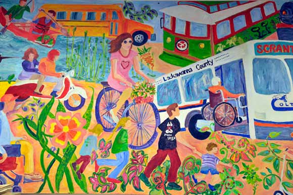 A large mural hangs inMaureen McGuigan's office